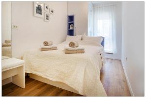 Posteľ alebo postele v izbe v ubytovaní AMALIJA APARTMENT