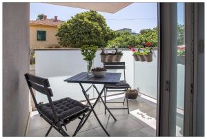 Balkón alebo terasa v ubytovaní AMALIJA APARTMENT + 8 fotografií
