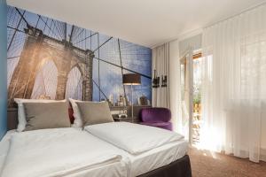 Postel nebo postele na pokoji v ubytování Best Western Hotel Nürnberg am Hauptbahnhof