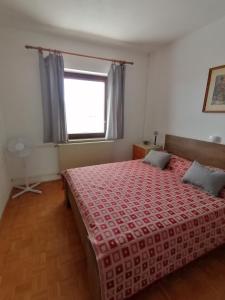 Postel nebo postele na pokoji v ubytování Apartmaji Karbic