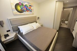 Petit Hotel Elita客房内的一张或多张床位