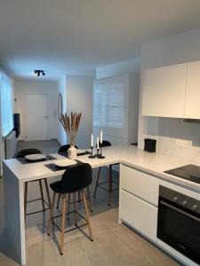 Kjøkken eller kjøkkenkrok på New appartement centre de Spa avec parking privé