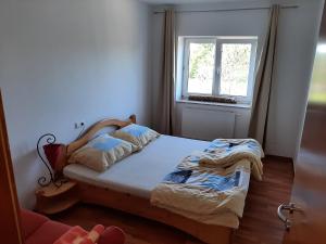 Postel nebo postele na pokoji v ubytování Sundowner appartment at the lakeside - 120sqm