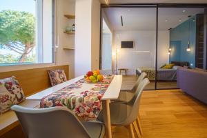 Posedenie v ubytovaní Domus Aurea Luxury Apartment Cefalù