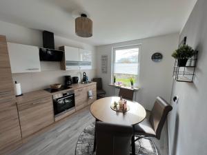 Kuchyň nebo kuchyňský kout v ubytování Dianna deluxe