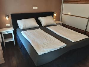 Postel nebo postele na pokoji v ubytování Haus am Soleweg