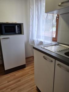 Kjøkken eller kjøkkenkrok på KM3 Apartment