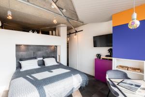 Letto o letti in una camera di Le Garage