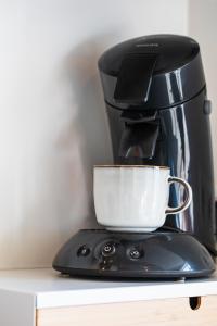 Set per la preparazione di tè e caffè presso Le Garage