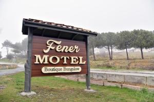 a sign for a motel on the side of a road at Fener Motel in Şile