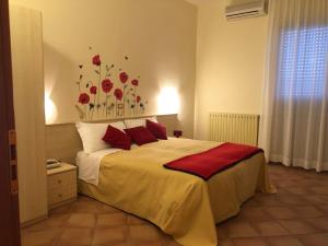Voodi või voodid majutusasutuse Hotel Di Rocco toas