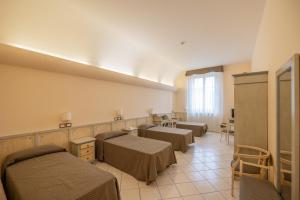Ένα ή περισσότερα κρεβάτια σε δωμάτιο στο Villa Santa Margherita - B&B +60 φωτογραφίες