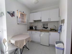 Casa Dan "Residencial Las Dunas"にあるキッチンまたは簡易キッチン