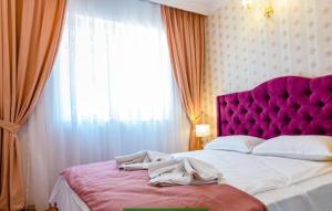 A bed or beds in a room at Sweet Homes 6