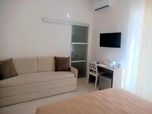 TV a/nebo společenská místnost v ubytování B&B Casa Denittis