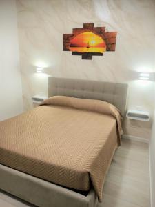 Postel nebo postele na pokoji v ubytování B&B Casa Denittis