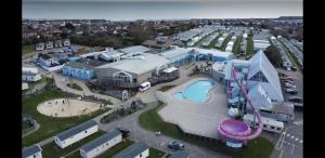 an aerial view of a water park with a water slide at Seaview Homes in Hastings