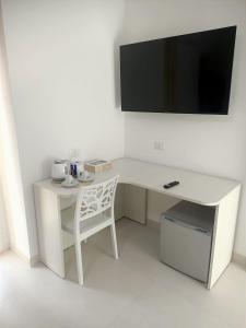 TV a/nebo společenská místnost v ubytování B&B Casa Denittis