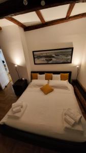 Katil atau katil-katil dalam bilik di Ad un passo dall'Acquario in zona Expo