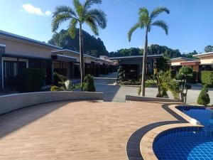 Photo de la galerie de l'établissement สวนหินวิลล่า รีสอร์ท, à Ban Chot