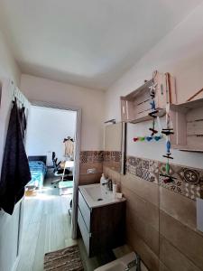 A kitchen or kitchenette at Le case di Pat - Casa Marea
