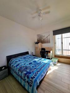 A bed or beds in a room at Le case di Pat - Casa Marea