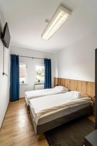 Voodi või voodid majutusasutuse Gems Hostel toas