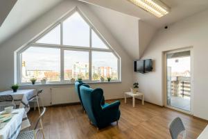 TV a/nebo společenská místnost v ubytování Gems Hostel