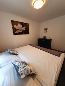 Łóżko lub łóżka w pokoju w obiekcie Apartmány Sunny hill