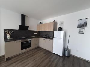 Kuchnia lub aneks kuchenny w obiekcie Apartmány Sunny hill