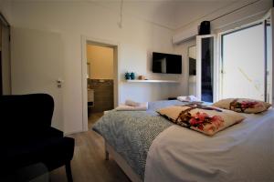 Voodi või voodid majutusasutuse B&B Belvedere All'Idria toas