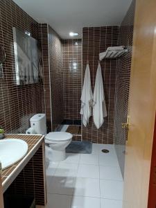 Kúpeľňa v ubytovaní PRECIOSO APARTAMENTO con TERRAZA y PISCINA