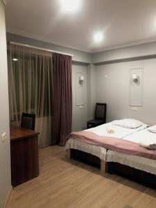 Letto o letti in una camera di Guest House Anahit Ijevan