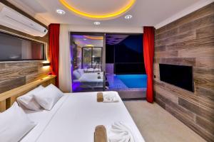 A bed or beds in a room at Villa Asal, villa with private pool and amazing mountain view