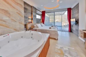A bed or beds in a room at Villa Asal, villa with private pool and amazing mountain view