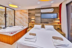 A bed or beds in a room at Villa Asal, villa with private pool and amazing mountain view