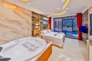 A bed or beds in a room at Villa Asal, villa with private pool and amazing mountain view