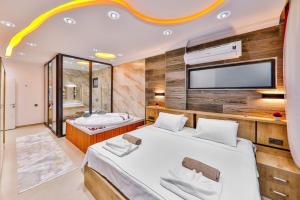 A bed or beds in a room at Villa Asal, villa with private pool and amazing mountain view