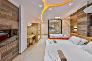 A bed or beds in a room at Villa Asal, villa with private pool and amazing mountain view