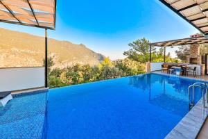 The swimming pool at or close to Villa Asal, villa with private pool and amazing mountain view