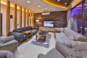 A seating area at Villa Asal, villa with private pool and amazing mountain view