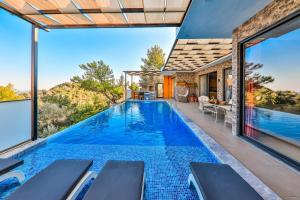 The swimming pool at or close to Villa Asal, villa with private pool and amazing mountain view