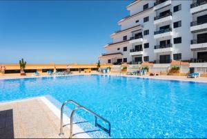 Bazén v ubytování Apartamento ohana nebo v jeho okolí
