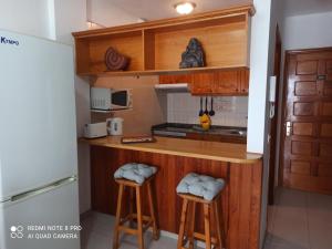 Η κουζίνα ή μικρή κουζίνα στο Apartamento ohana