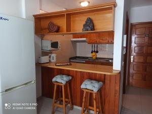 Kuchyň nebo kuchyňský kout v ubytování Apartamento ohana