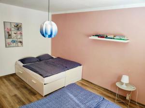 Postel nebo postele na pokoji v ubytování Apartmán Domov Děčín