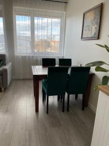 Posedenie v ubytovaní Apartament Dziewiątka