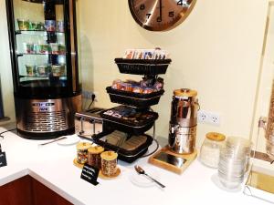 Set per la preparazione di tè e caffè presso Hotel Apollon Rust