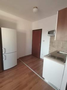 Kuchyň nebo kuchyňský kout v ubytování Guest House Sunce