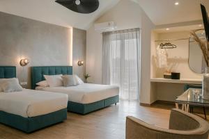 Postel nebo postele na pokoji v ubytování Socrates Apartments